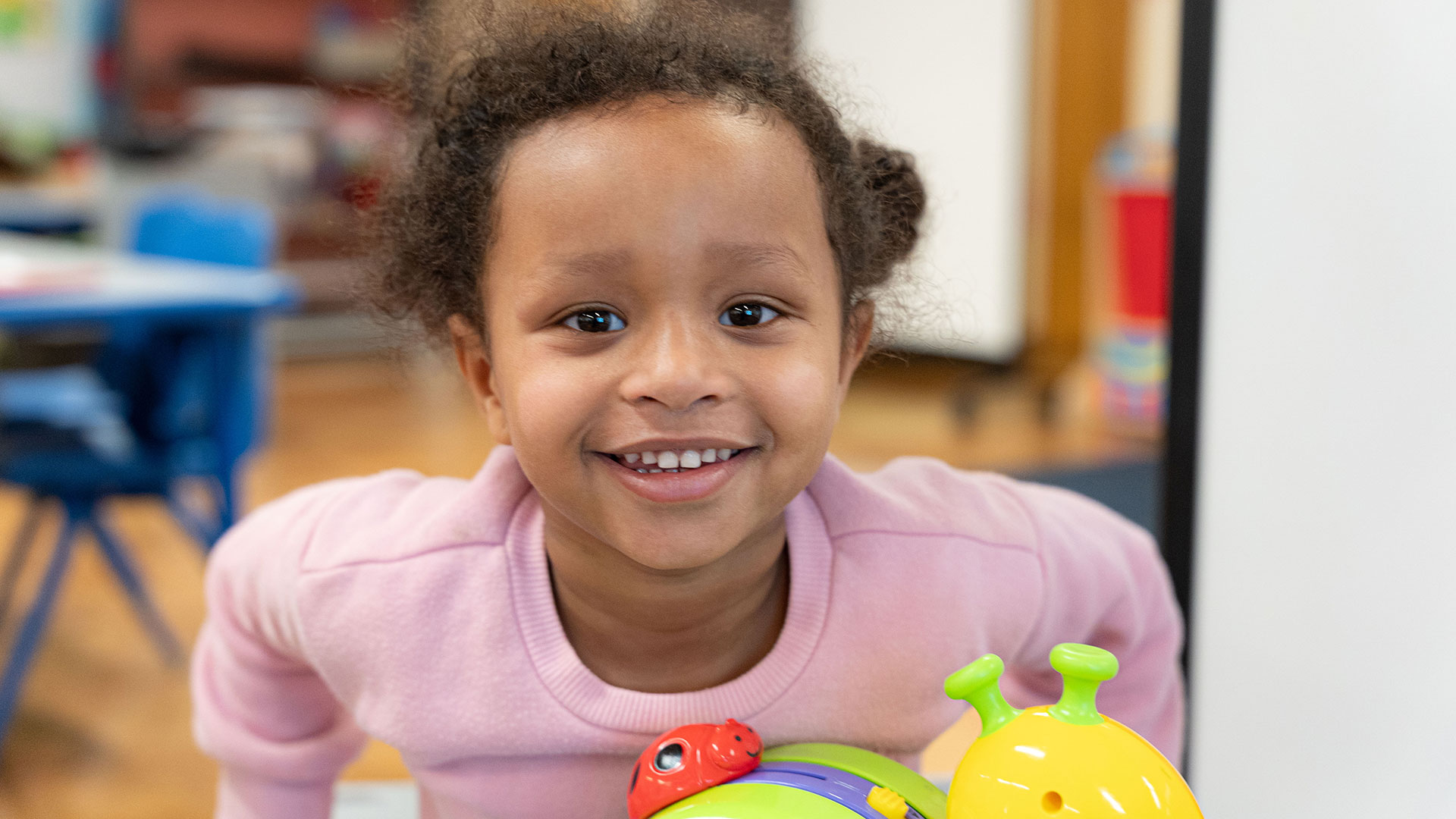 Close-up of a smiling girl.