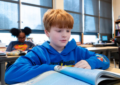 Students in a classroom at their desks.