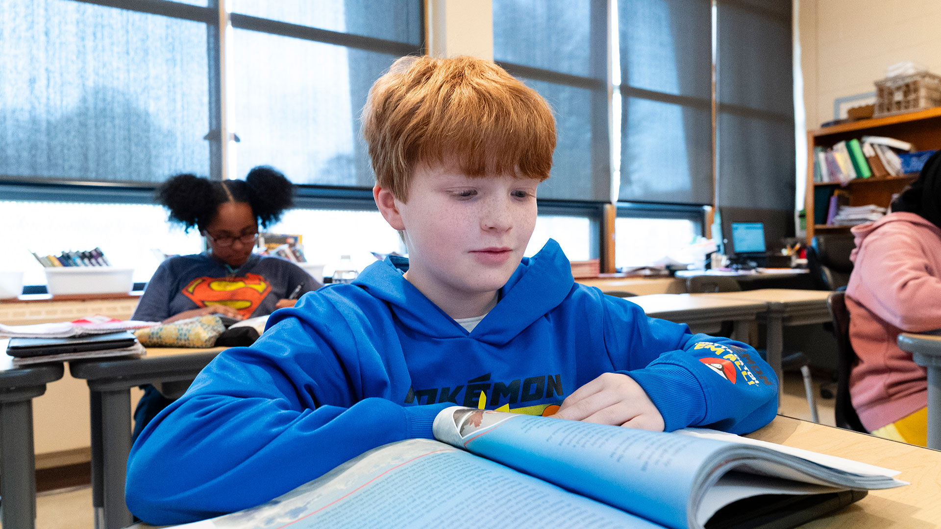 Students in a classroom at their desks.