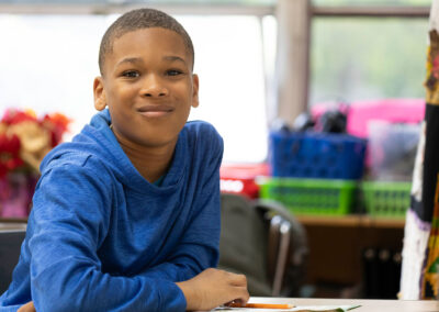 A boy smiling.