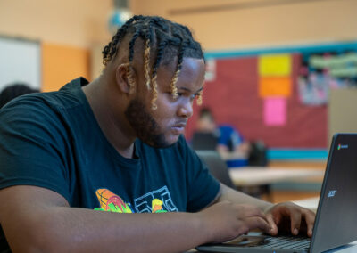 A person using a computer.