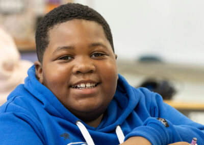 Closeup of a smiling boy.