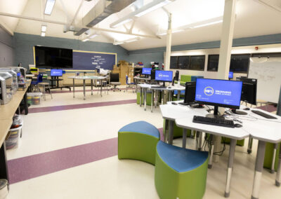 The GE Innovation Lab classroom with computers and 3D printers.