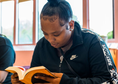 A student reading a book.