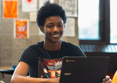 A student using a computer.