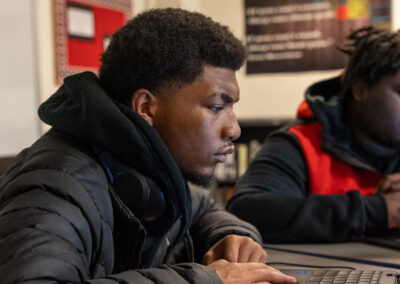 Two students using computers.