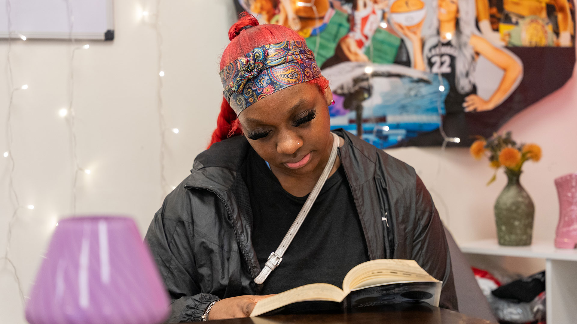 A girl reading a book.