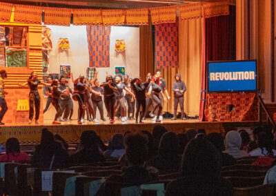 Student perform on stage during our Black History Program.